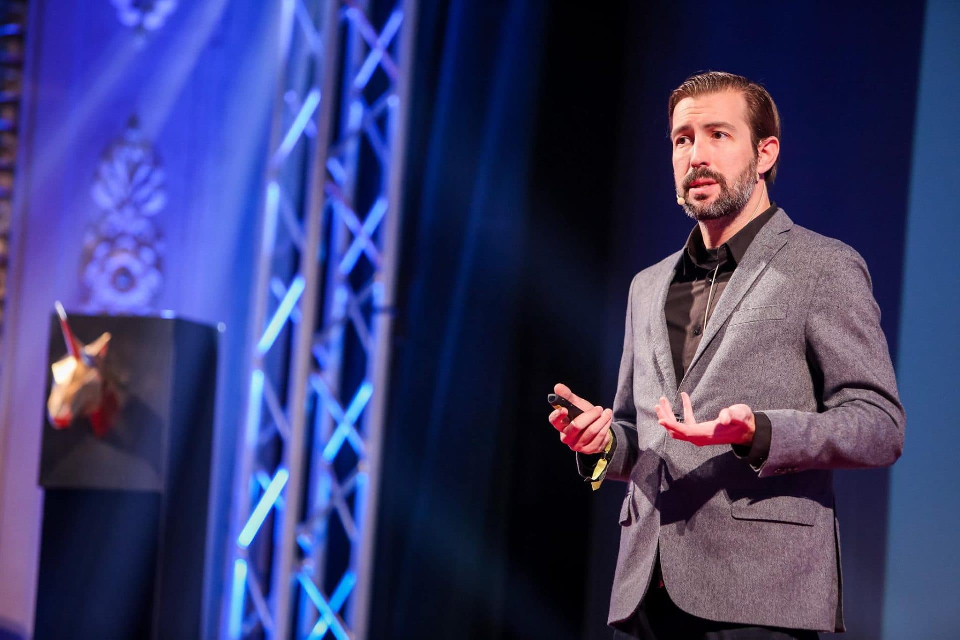 Sean Percival speaking on stage